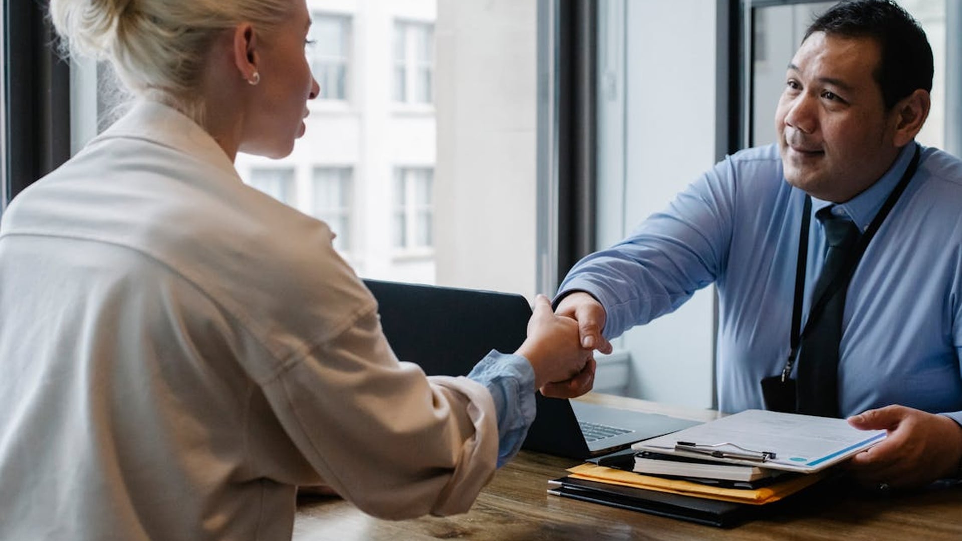 Professional business partnership handshake