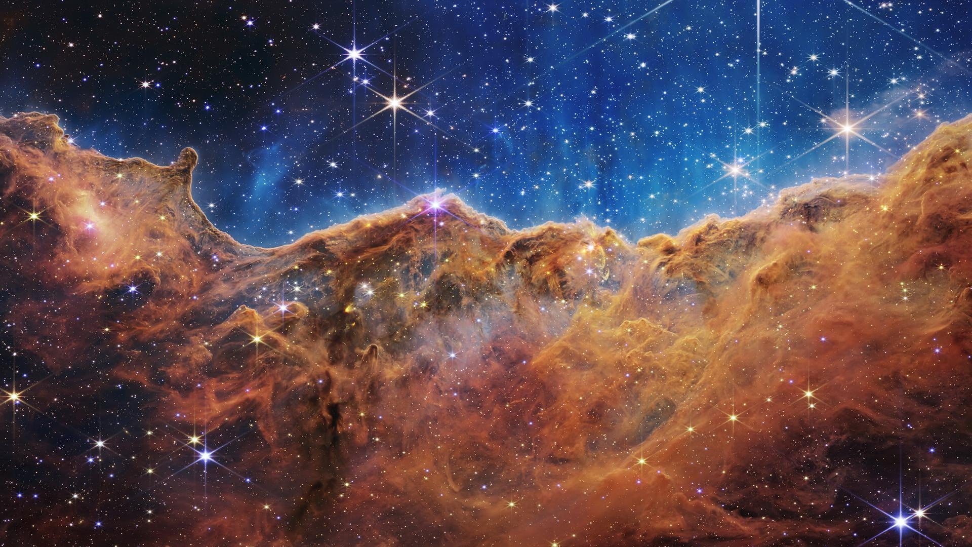 Webb’s infrared image of the Cosmic Cliffs in the Carina Nebula