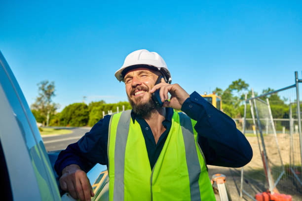 Contractor checking their new professional website on phone - LocalWebEdge client