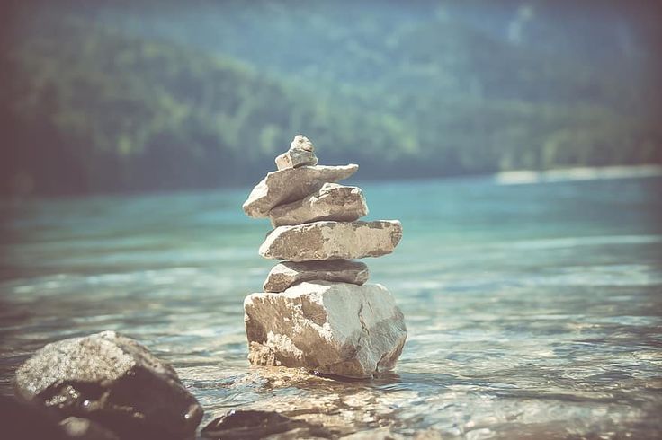 Peaceful stacked rocks representing calm and relief