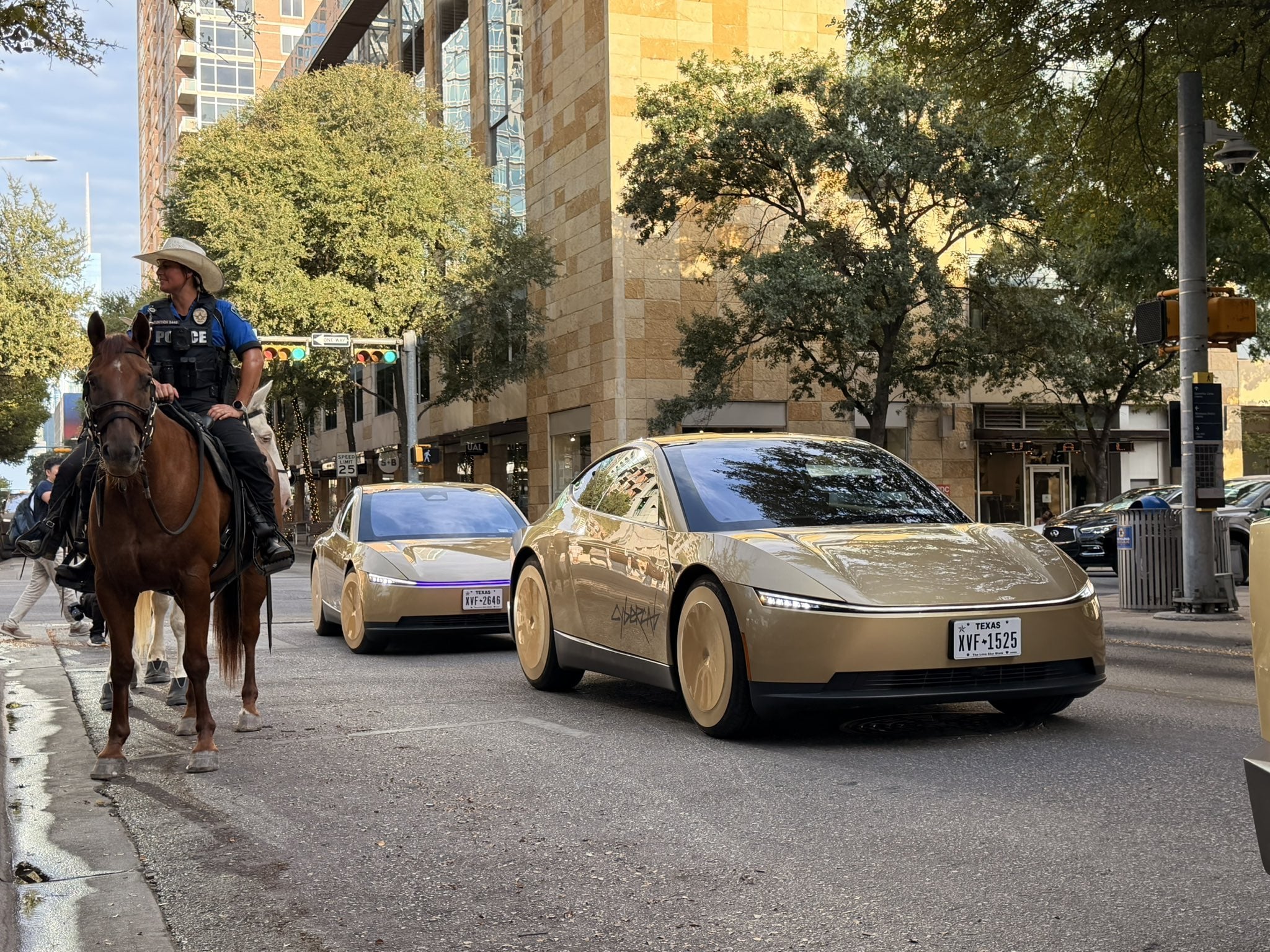 Tesla Cybercab autonomous vehicle on the road, illustrating the next generation of purpose-built autonomous passenger vehicles