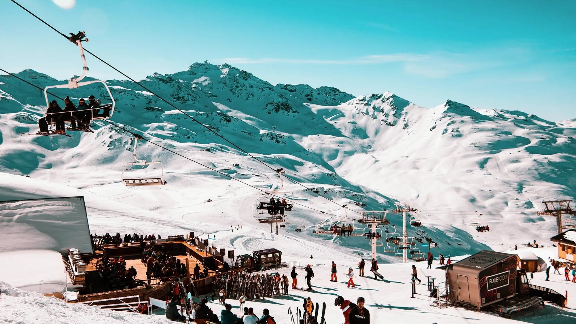 Skiing the slopes of Val Thorens on a sunny day