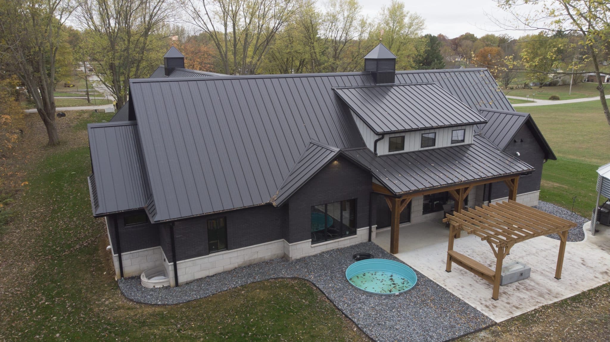 Modern farmhouse with black metal roof