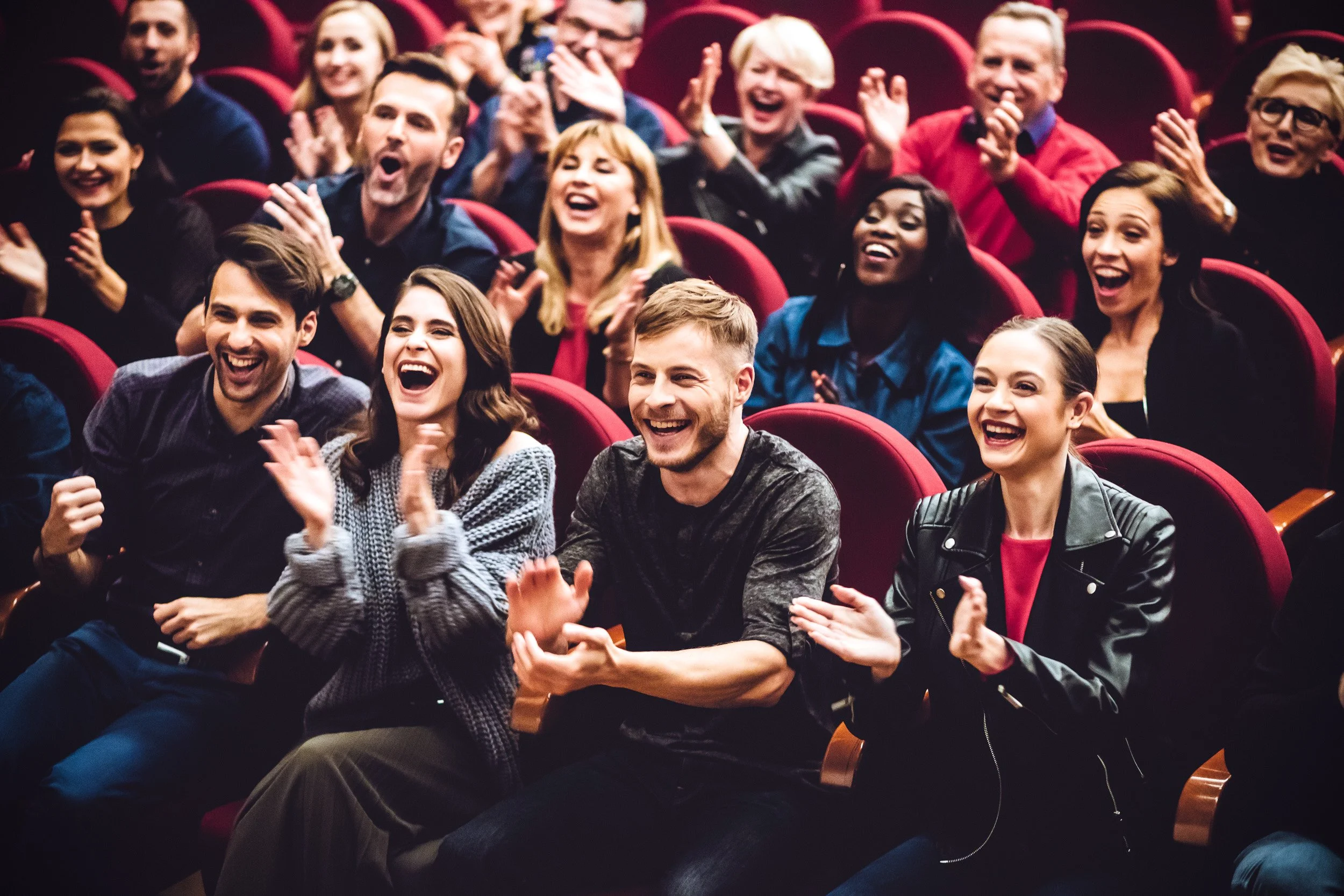 Church congregation laughing and enjoying a clean comedy fundraiser event