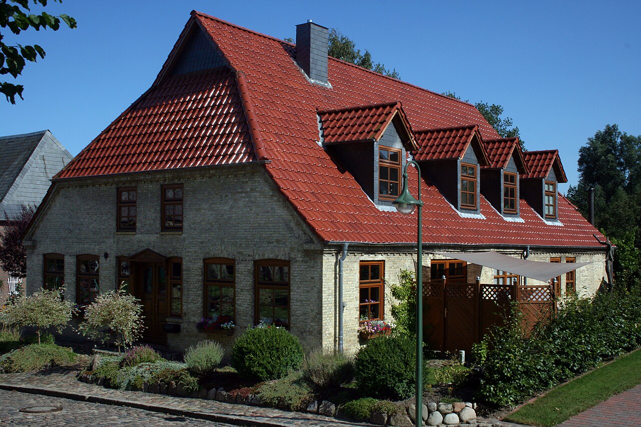 Dutch gable house with red tiled roof