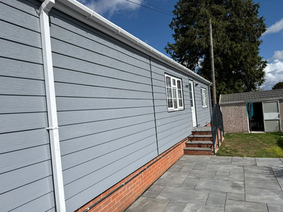 Finished wall cladding panels