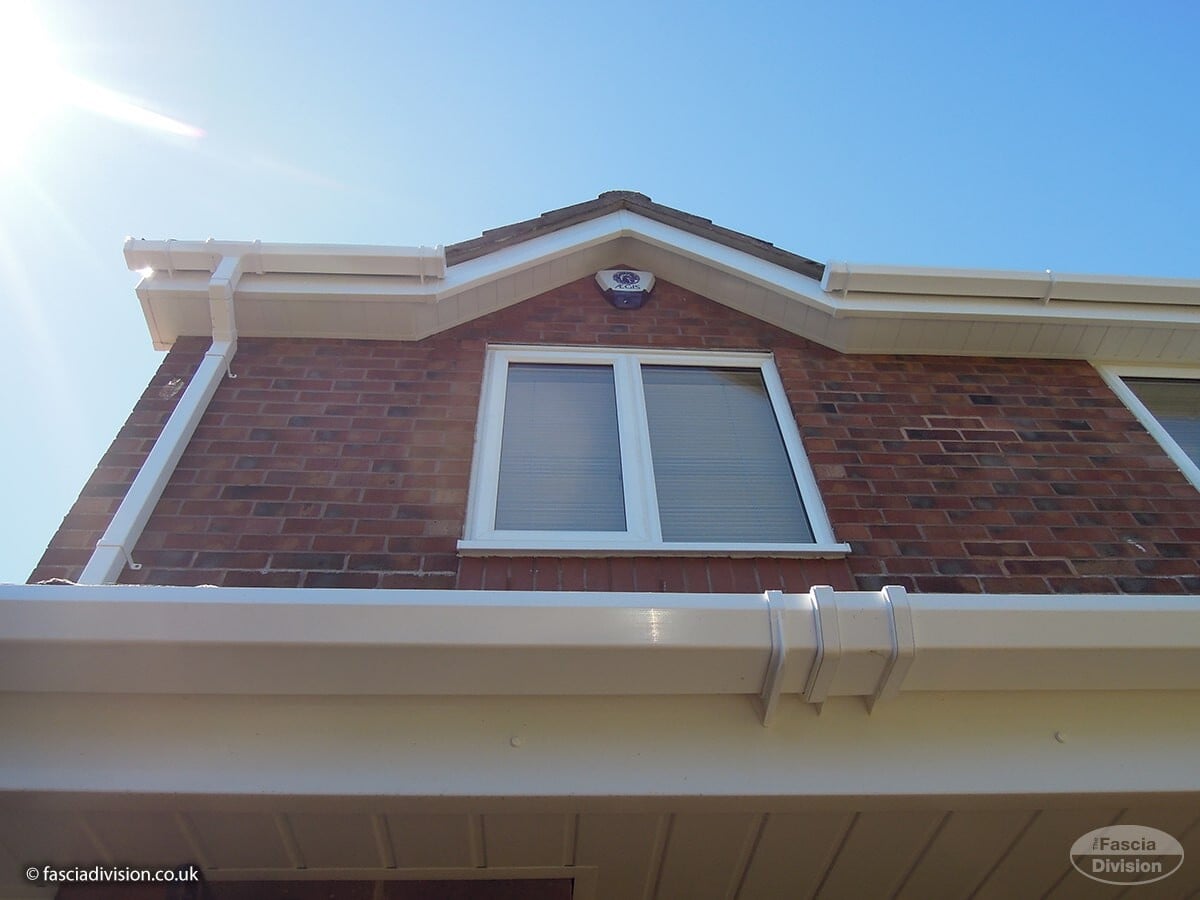White uPVC fascia boards and soffits along a UK house roofline
