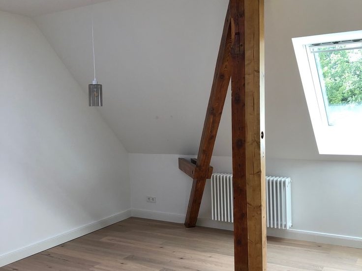 Dachausbau mit Sichtdachstuhl