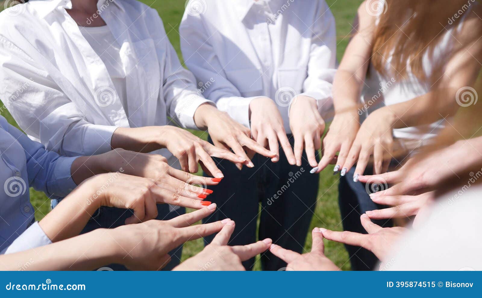 Diverse hands joined together showing unity and community connection