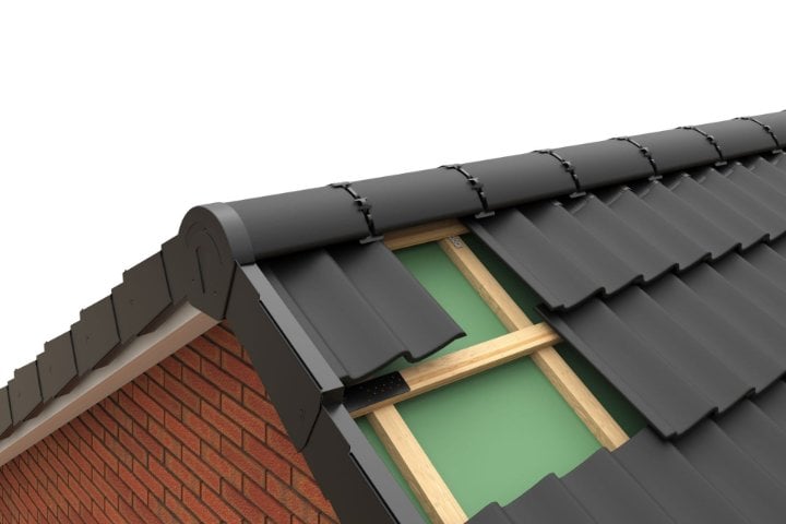 Dry ridge roll system being installed along a roof apex