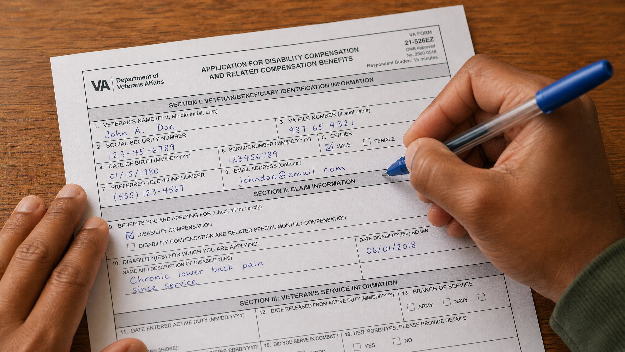 Hands completing a VA Form 21-526EZ disability compensation claim