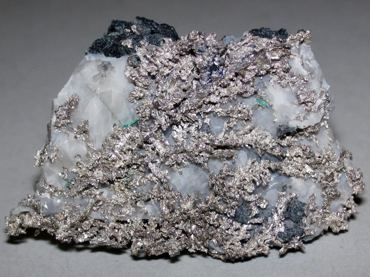 Shiny silver bars and ore