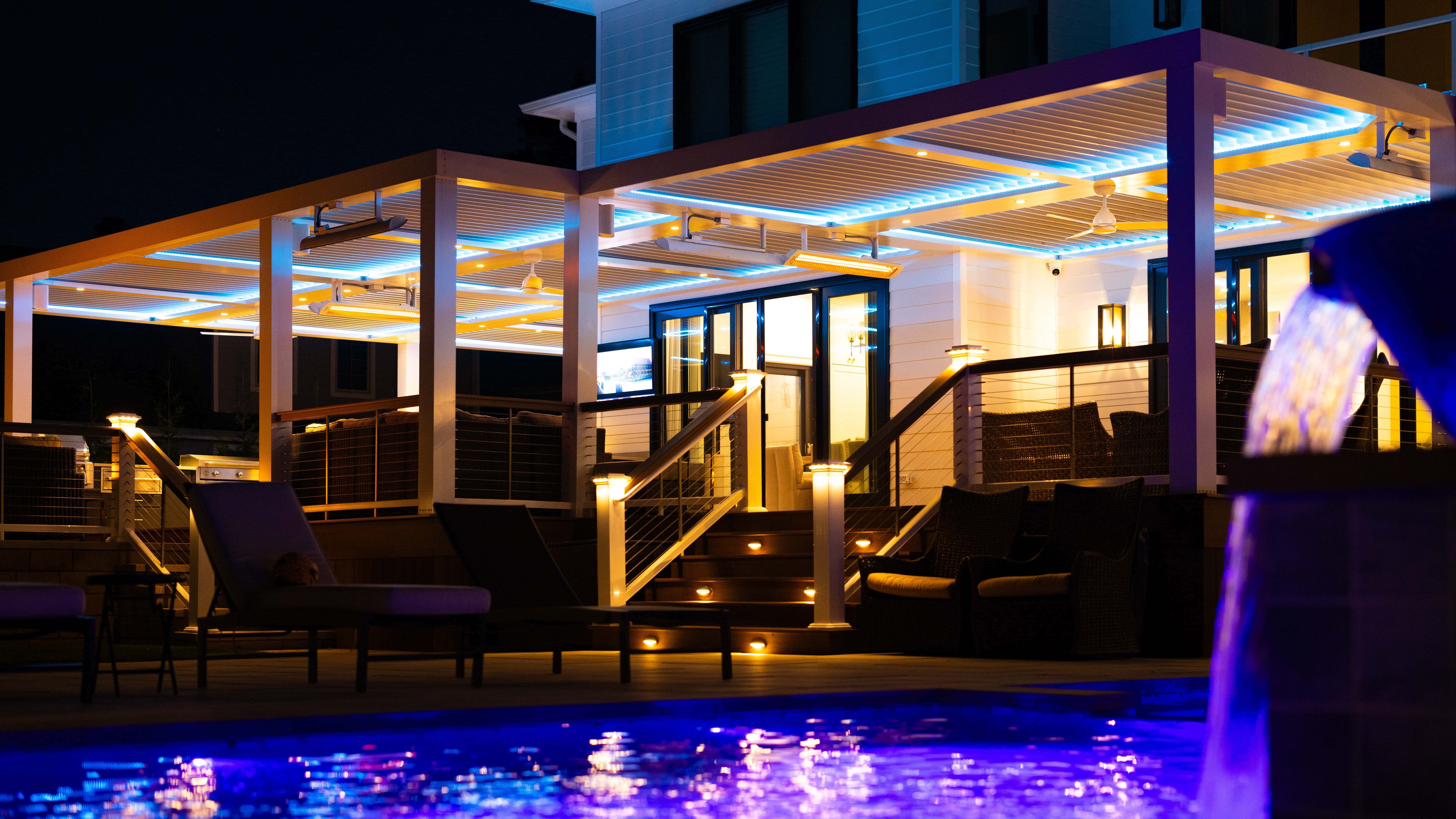 Luxury outdoor living space with pool pergola and landscape lighting